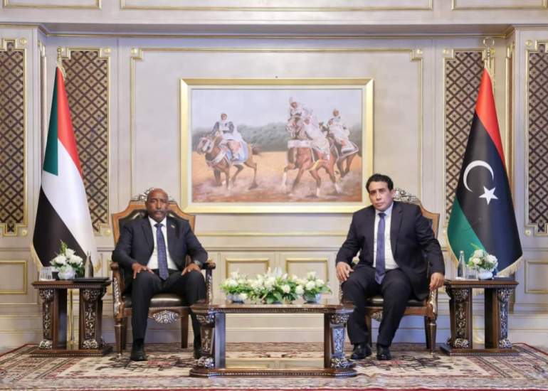 1708978714881-1709012028 عبد الفتاح البرهان مع رئيس المجلس الرئاسي الليبي محمد المنفي
