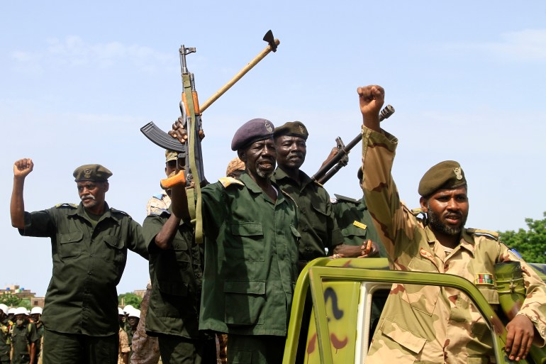 33r86ta-highres-1692164857 Sudanese armed forces mark Army Day in Sudan's eastern Gadaref State near the border with Ethiopia on August 14, 2023. - Fighting since April 15 between the forces of rival Sudanese generals vying for power has killed at least 3,900 people, according to conservative estimates by the Armed Conflict Location & Event Data Project. (Photo by - / AFP)