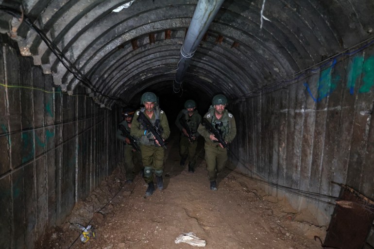 347z6ax-highres-1706803432 In this picture taken during a media tour organised by the Israeli military on December 15, 2023, soldiers visit a tunnel that Hamas reportedly used to attack Israel through the Erez border crossing on October 7. - The Israeli army said on December 17, 2023 it had uncovered the biggest Hamas tunnel in the Gaza Strip so far, just a few hundred metres from the Erez border crossing. (Photo by JACK GUEZ / AFP)