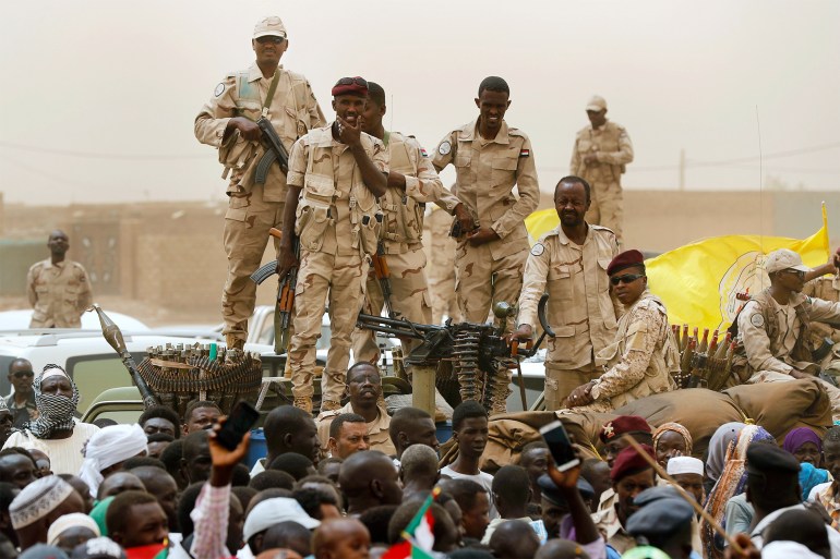 ap23249592525780-1694704830 Sudanese soldiers from the Rapid Support Forces unit stand on their vehicle during a military-backed rally, in Mayo district, south of Khartoum, Sudan, Saturday, June 29, 2019. The United States imposed sanctions Wednesday, Sept. 6, 2023, on a Sudanese Rapid Support Forces paramilitary commander Abdelrahim Hamdan Dagalo for acts of violence and human rights abuses committed by his troops in their monthslong conflict with Sudan's army. (AP Photo/Hussein Malla, File)