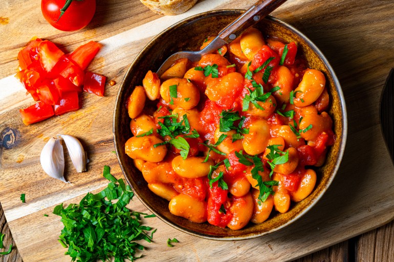 shutterstock_1748932310-1708706502 Rustic giant beans with fresh tomato sauce