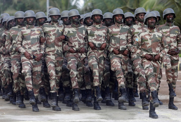 somalia3-1708806531 Somali military officers march in a parade during celebrations to mark the 62nd anniversary of the Somali National Armed Forces in Mogadishu, Somalia April 12, 2022. REUTERS/Feisal Omar
