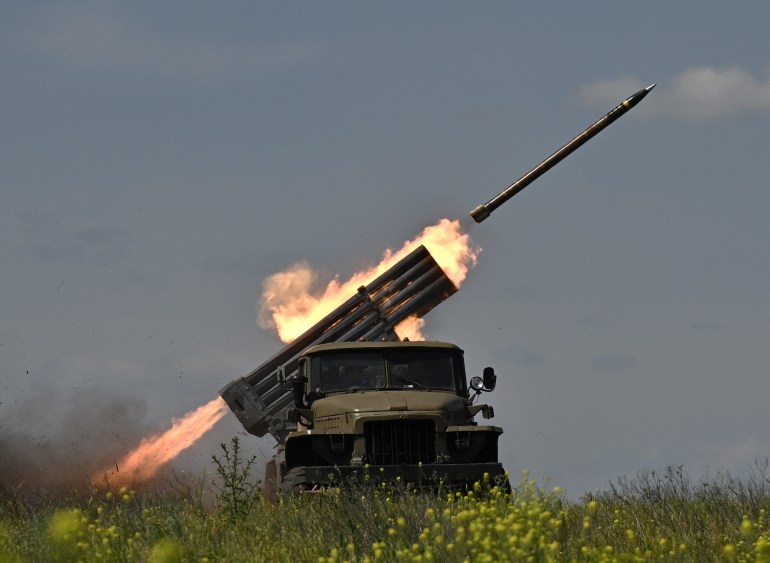 d8a8d98ad8b3d984d8b3d98ad8a8d984d98ad8b32-1701853218 Ukrainian servicemen of the 57th Brigade fires BM-21 'Grad' multiple rocket launcher towards Russian positions at a front line near Bakhmut in the Donetsk region on June 20, 2023, amid the Russian invasion of Ukraine. (Photo by Genya SAVILOV / AFP)