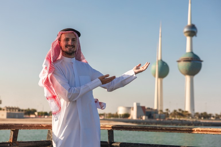 gettyimages-1805978621-1710929286 Portrait of a young sheik by the Kuwait towers.