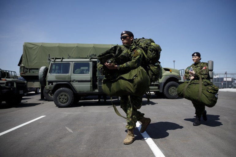 pic98468-1696979872 TORONTO, ON - APRIL 06: Members of the Canadian Forces head to their vehicles at Denison Armory to convoy to CFB Borden amid the spread of the coronavirus disease (COVID-19) on April 6, 2020 in Toronto, Canada. Troops will remain ready to respond to any requests made by any levels of government in Canada to help fight the pandemic. Cole Burston/Getty Images/AFP (Photo by Cole Burston / GETTY IMAGES NORTH AMERICA / Getty Images via AFP)