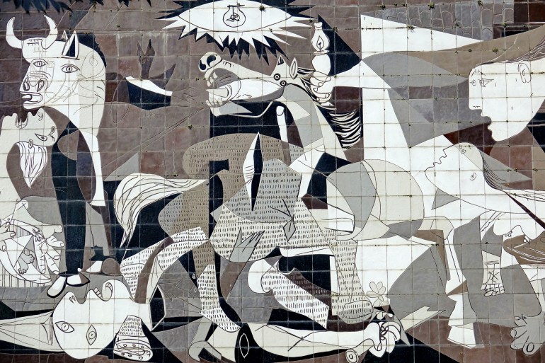 shutterstock_2174773901-1710870173 A tiled wall in Gernika reminds of the bombing during the Spanish Civil War. Guernica, Spain - August 2018