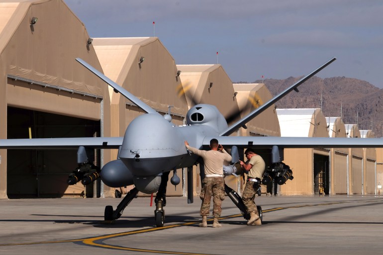 mq-9-3-1699465039 U.S. airmen prepare a U.S. Air Force MQ-9 Reaper drone as it leaves on a mission at Kandahar Air Field, Afghanistan March 9, 2016. Picture taken March 9, 2016. REUTERS/Josh Smith