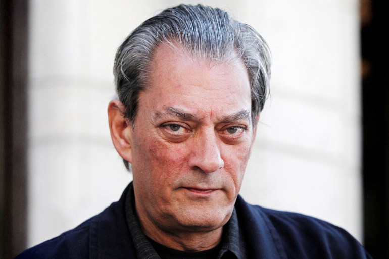 FILE PHOTO: U.S. author Paul Auster poses for a photograph before an interview in Stockholm May 10, 2011.