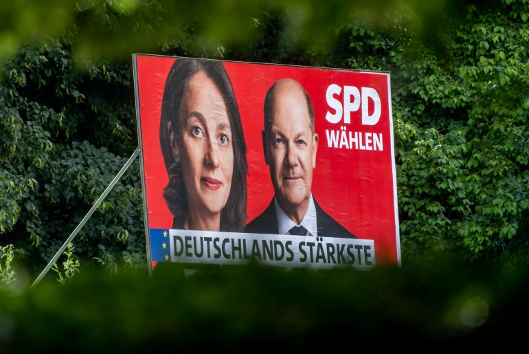 26078435-1717162540 With portraits of German Chancellor Olaf Scholz, right, and top candidate Katarina Barley and the slogans 'Vote SPD' and 'Germany's strongest voice for europe' the Social Democratic Party campaigning for votes in the European election, in Frankfurt, Germany, Thursday, May 30, 2024. The European elections will take place form June 6 to June 9. German politics are in a disgruntled, volatile state as the country's voters prepare to fill 96 of the 720 seats at the European Parliament on June 9, the biggest single national contingent in the 27-nation European Union. It's the first nationwide vote since center-left Chancellor Olaf Scholz took power in late 2021. (AP Photo/Michael Probst)