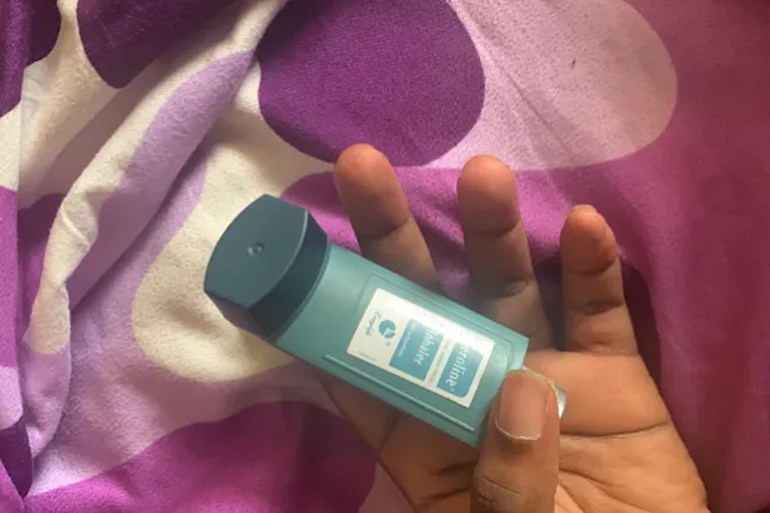 Mofifoluwa holding her Aeroline alternative inhaler [Courtesy of Gloria Mofifoluwa]