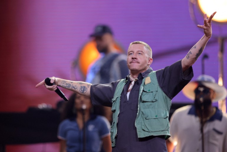 544545-1717409500 Rapper Macklemore performs during the opening ceremony of the Invictus Games, in Duesseldorf, Germany, September 9, 2023. REUTERS/Thilo Schmuelgen