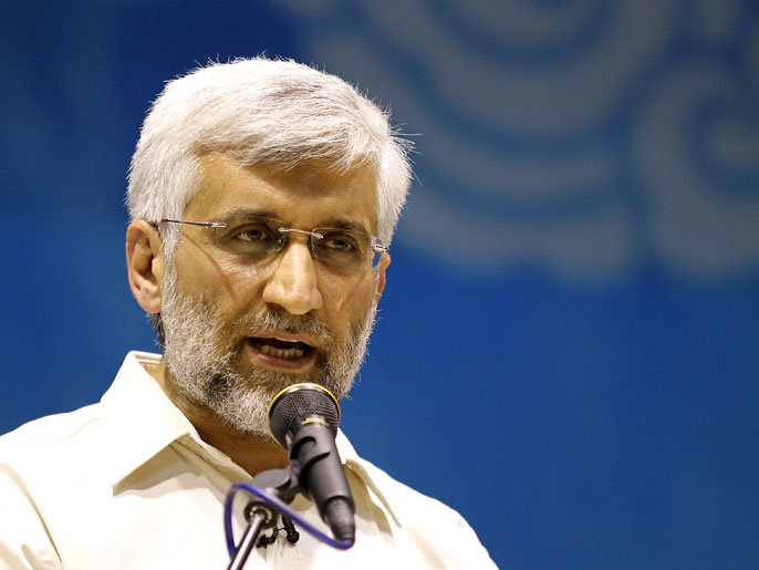 73644884-2e05-498f-9ea6-7281c49ead0e AK007 - Tehran, -, IRAN : Iranian presidential candidate and lead nuclear negotiator Saeed Jalili speaks to supporters during a campaign rally in Tehran on May 24, 2013. US Secretary of State John Kerry slammed Iran for its barring of would-be candidates for a presidential election next month. Only eight candidates won approval to stand -- five conservatives close to supreme leader Ayatollah Ali Khamenei, two moderates and a reformist -- in a decision welcomed by some 150 members of the 290-member parliament. AFP PHOTO/ATTA KENARE