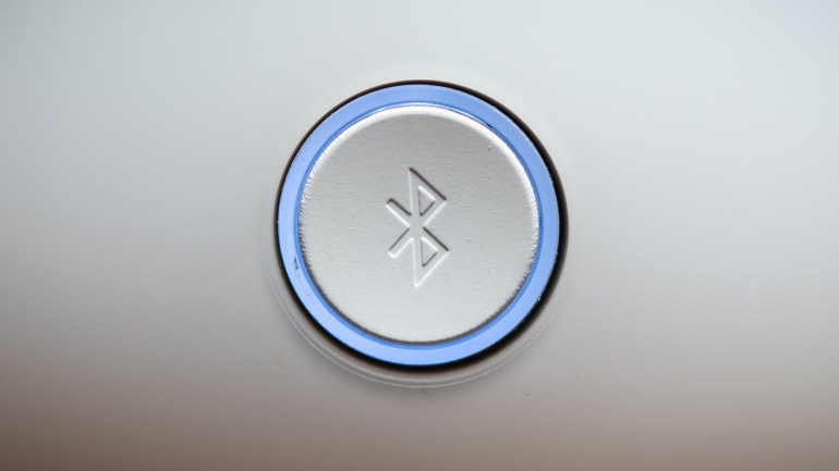 Detail of the Bluetooth button of an audio system in Mexico City on December 6, 2018 (Photo by Omar TORRES / AFP)