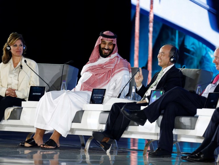 befa8a9c-bb94-41ad-9472-a6409b443be2 Saudi Crown Prince Mohammed bin Salman and Masayoshi Son, SoftBank Group Corp. Chairman and CEO, attend the Future Investment Initiative conference in Riyadh, Saudi Arabia October 24, 2017. REUTERS/Faisal Al Nasser