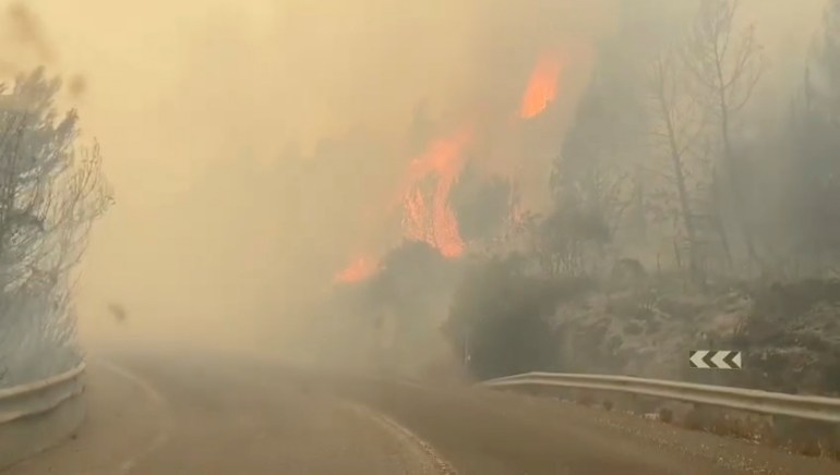 Smoke fills the air as a wild fire set off by rockets launched from Lebanon by the militant group Hezbollah burns at a location given as Kiryat Shmona, Israel, close to its border with Lebanon, in this still image taken from video released June 3, 2024. Israel Fire & Rescue/Handout via REUTERS THIS IMAGE HAS BEEN SUPPLIED BY A THIRD PARTY. NO RESALES. NO ARCHIVES. MANDATORY CREDIT
