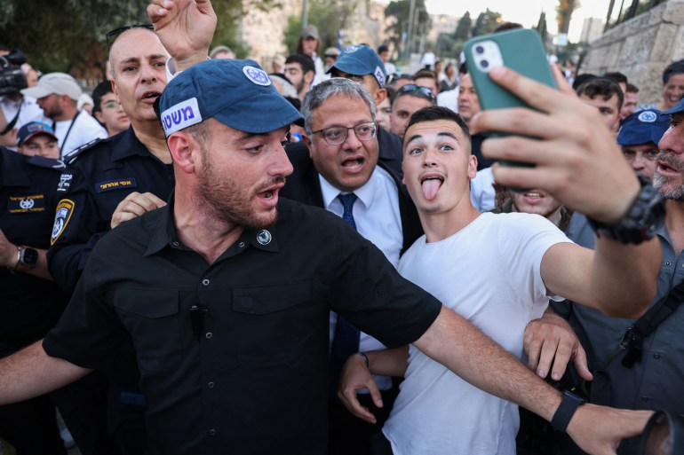 Israel's National Security Minister Itamar Ben-Gvir joins right-wing activists rallying at Jerusalem's Damascus Gate on June 5, 2024 during the so-called Jerusalem Day flag march, that commemorates the Israeli army's capture in the 1967 Arab-Israeli war of the city's eastern sector, home to the Al-Aqsa mosque compound, Islam's third holiest site, which Jews call the Temple Mount. (Photo by HAZEM BADER / AFP)
