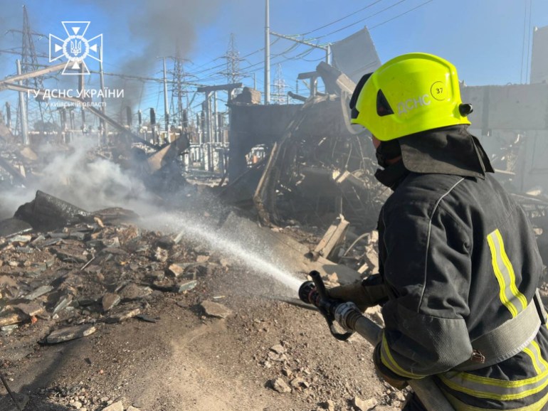 rtscrow4 Firefighters work to put out a fire at energy infrastructure facilities, damaged by a Russian missile strike in Kyiv region in Ukraine