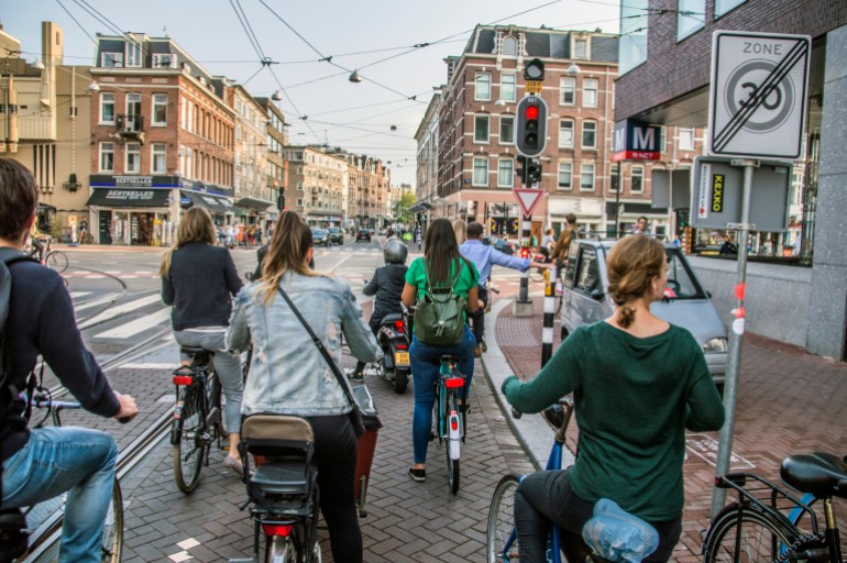 shutterstock_1180846177-1717414374 Bicycles Waiting At A Stoplight At Amsterdam The Netherlands 2018; Shutterstock ID 1180846177; purchase_order: ajnet; job: ; client: ; other: