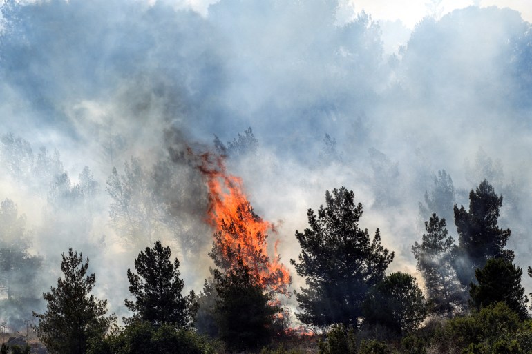 Smoke and fire rises following over border attacks from Lebanon, amid ongoing cross-border hostilities between Hezbollah and Israeli forces, close the Israeli border with Lebanon, seen from the Israeli side June 3, 2024. REUTERS/Ayal Margolin ISRAEL OUT. NO COMMERCIAL OR EDITORIAL SALES IN ISRAEL TPX IMAGES OF THE DAY