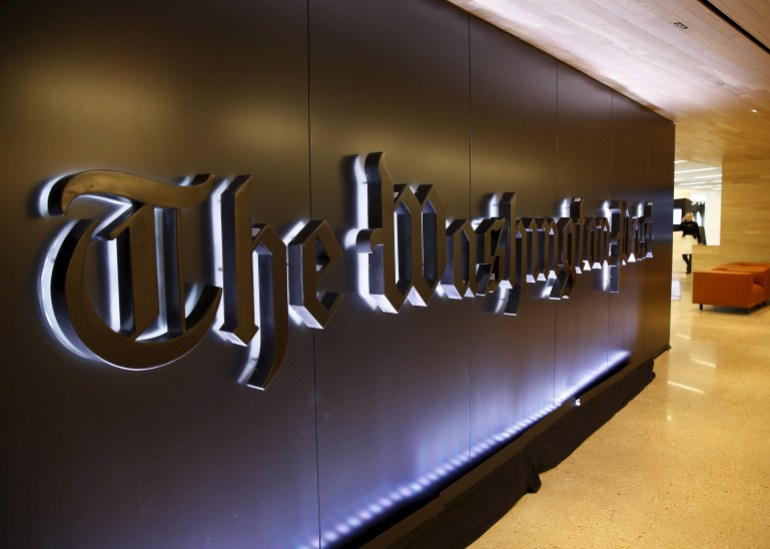 wp-1718868871 The newspaper's banner logo is seen during the grand opening of the Washington Post newsroom in Washington January 28, 2016. REUTERS/Gary Cameron