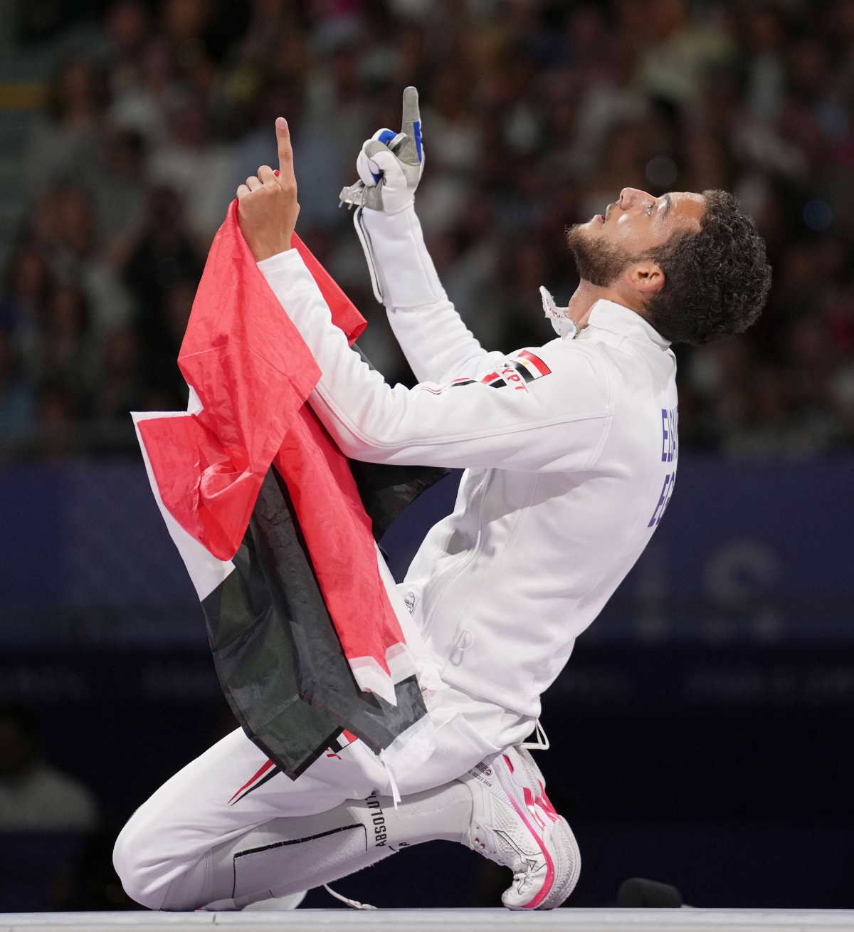 313418 السيد يحتفل بعد الفوز بالبرونزية