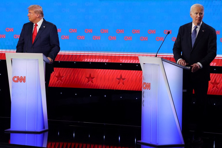 Democrat presidential candidate U.S. President Joe Biden and Republican presidential candidate and former U.S. President Donald Trump looks away from each other during their debate in Atlanta, Georgia, U.S., June 27, 2024. REUTERS/Brian Snyder