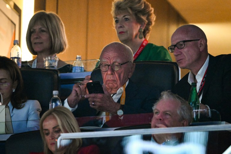 MILWAUKEE, WISCONSIN - JULY 17: Rupert Murdoch (C) attends the third day of the Republican National Convention at the Fiserv Forum on July 17, 2024 in Milwaukee, Wisconsin. Delegates, politicians, and the Republican faithful are in Milwaukee for the annual convention, concluding with former President Donald Trump accepting his party's presidential nomination. The RNC takes place from July 15-18. Leon Neal/Getty Images/AFP (Photo by LEON NEAL / GETTY IMAGES NORTH AMERICA / Getty Images via AFP)