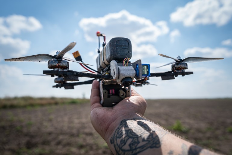 gettyimages-1602880428-1692447450 DONETSK OBLAST, UKRAINE - AUGUST 16: Ukrainian soldiers test homemade drones before sending them to the frontline as the Russia-Ukraine war continues in Donetsk Oblast, Ukraine on August 16, 2023. These drones, made of cheap electronics and 3d printed pieces can drop a 1.5 kg bomb. For the test exercise, the pilots attached a bottle of water. (Photo by Ignacio Marin/Anadolu Agency via Getty Images)