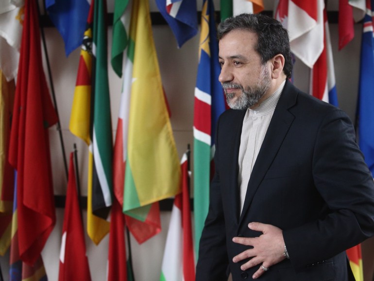 Iran's chief nuclear negotiator Abbas Araghchi leaves after giving a statement after meeting IAEA Director General Yukiya Amano (not pictured) at the IAEA headquarters in Vienna February 24, 2015. REUTERS/Heinz-Peter Bader (AUSTRIA - Tags: POLITICS ENERGY)