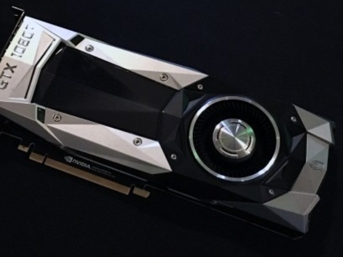 0e228f31-55e1-44d8-892b-26bf96e2cc7f تعتبر بطاقة الرسوميات نفيديا GTX 1080 Ti الجديدة أسرع موديل في سلسلة Ti، وتمتاز بزيادة الكفاءة والأداء بمقدار 35% مقارنة ببطاقة الرسوميات 1080 العادية. (النشر مجاني لعملاء وكالة الأنباء الألمانية "dpa". لا يجوز استخدام الصورة إلا مع النص المذكور وبشرط الإشارة إلى مصدرها.) عدسة: Nvidia