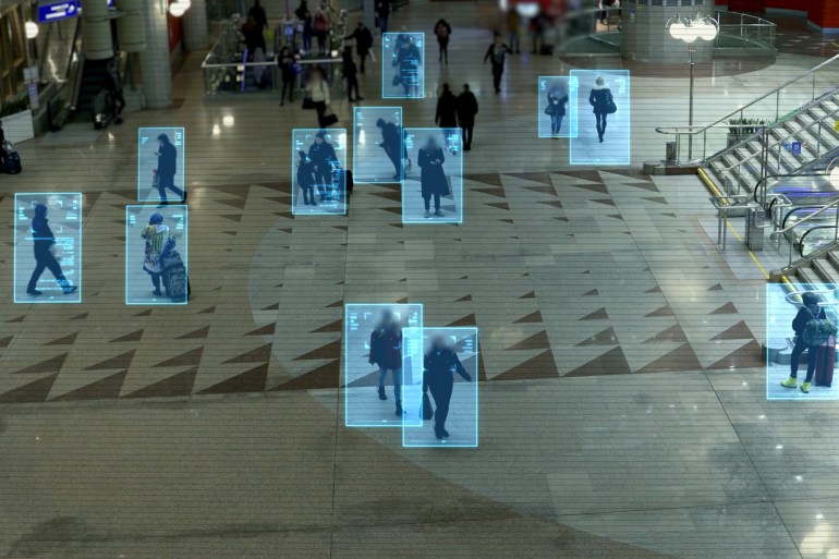 63855-1724785601 Facial recognition technology scan and detect people face for identification in crowded places. IOT CCTV, security camera motion detection system recognizes and identifies people using big data and AI شترستوك