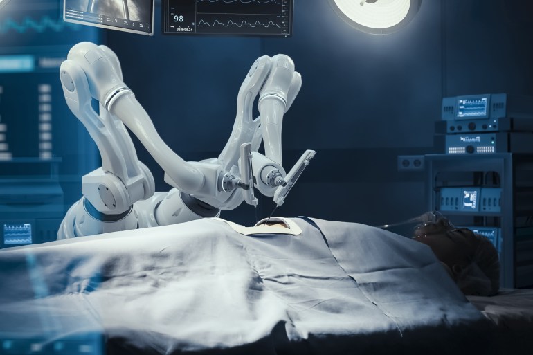 96-1724785323 Surgery Patient Laying On Surgical Table While Robot Arms Performing High-Precision Nanosurgery In Hospital. Automated Robotic Limbs Operating, VFX Holographic Displays Showing Puls, Blood Pressure شترستوك