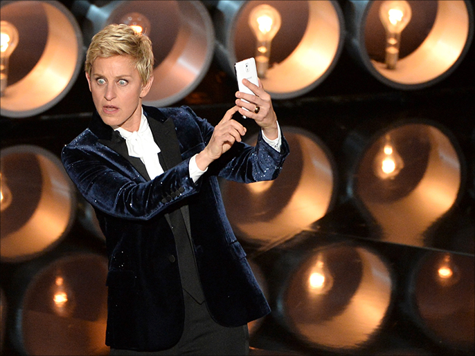 Host Ellen DeGeneres speaks onstage during the Oscars at the Dolby Theatre on March 2, 2014 in Hollywood
