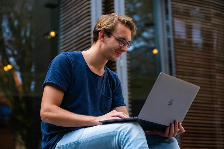 d8a2d8a8d984-1723445349 Selective Focus Photo of Man Using Laptop