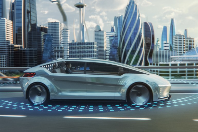 d8a8d98a2-1724785631 Futuristic Concept: Stylish Japanese Businessman Riding on a Back Seat of an Autonomous Self-Driving Zero-Emissions Electric Car. He is Riding on the Highway in the City of the Future. شترستوك