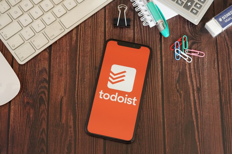 logo3-1723978480 Barcelona, Spain - June 11, 2020; Todoist App with Stationery on a Brown Wooden Table. Todoist is app to manage tasks and projects anywhere. Todoist