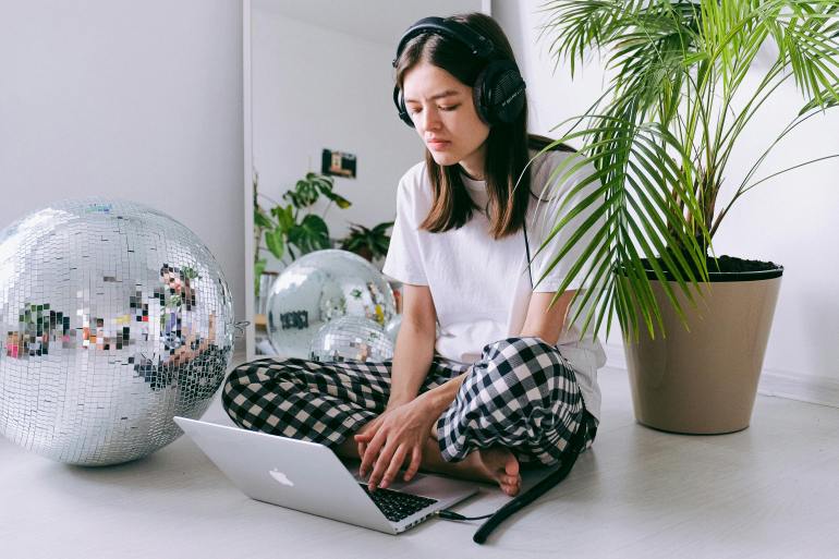 pc3-1720171558 Woman In White Crew Neck T-shirt Using Macbook