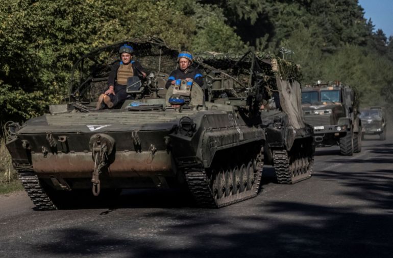 rc2rf9abxxxo-1723700688 krainian servicemen ride an armoured personnel carrier near the Russian border in Sumy regionUkrainian servicemen ride an armoured personnel carrier, amid Russia's attack on Ukraine, near the Russian border in Sumy region, Ukraine August 14, 2024. REUTERS/Viacheslav Ratynskyi DATE 14/08/2024 SIZE 3500 x 2296 Country Ukraine SOURCE REUTERS/Viacheslav Ratynskyi