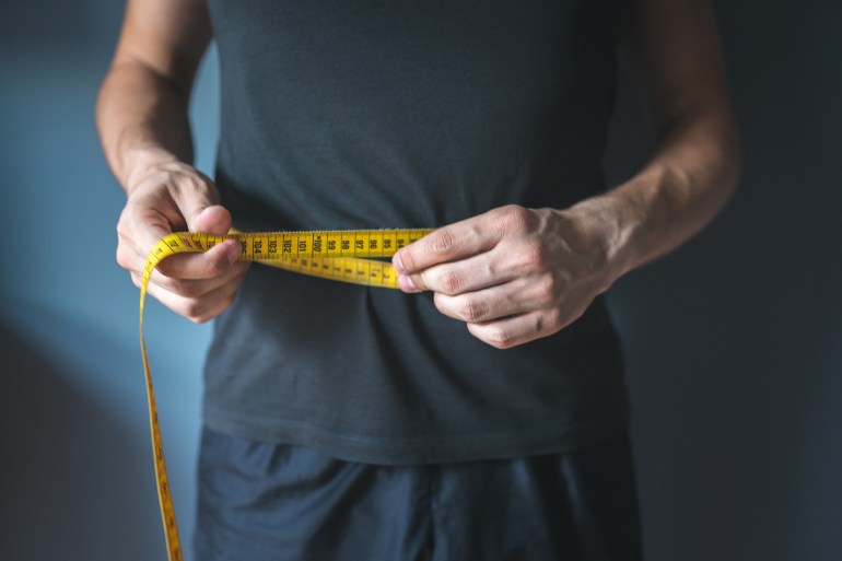 gettyimages-1191251475-1725200846 Dieting, Healthy Eating, Men, Overweight, Measuring Tape