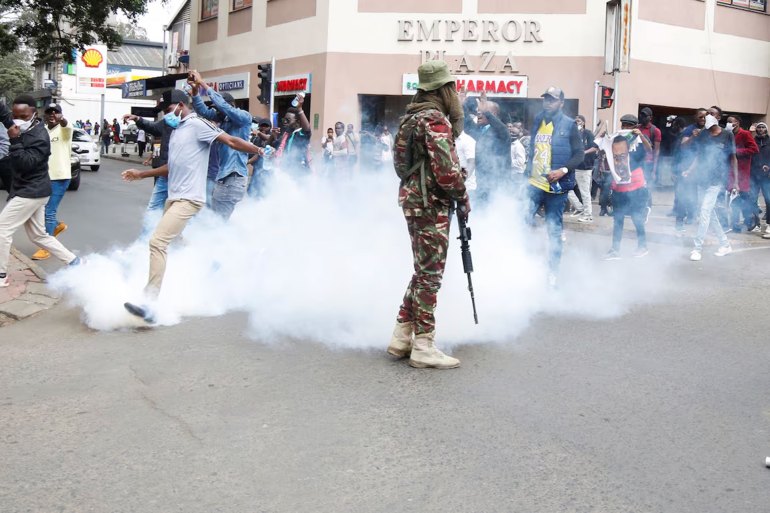 [1/5]Protestors react after police use teargas to disperse them during a demonstration against Kenya's proposed finance bill 2024/2025, in Nairobi, Kenya, June 20, 2024. REUTERS