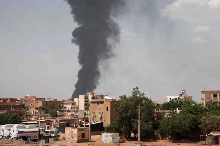ap2419py-1727776962-2 FILE - Smoke rises over Khartoum, Sudan, Thursday, June 8, 2023, as fighting between the Sudanese army and paramilitary Rapid Support Forces continues. The United Nations was hosting closed-door talks in Geneva Thursday July 11, 2024 involving Sudan’s warring sides about how to protect civilians and ensure the delivery of humanitarian aid. (AP Photo, File)