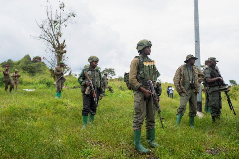 Congolese M23 rebels are seen as before they withdraw from the 3 antennes location in Kibumba, near Goma, North Kivu province of the Democratic Republic of Congo, December 23, 2022. REUTERS/Arlette Bashizi