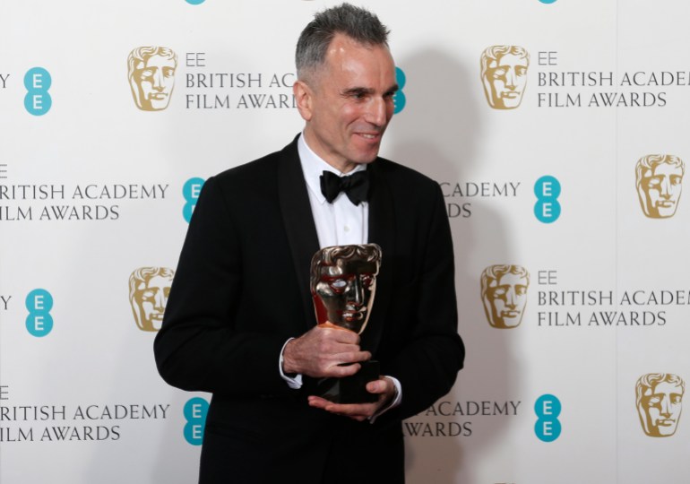 Daniel Day-Lewis celebrates after winning the Best Actor award for "Lincoln" at the British Academy of Film and Arts (BAFTA) awards ceremony at the Royal Opera House in London February 10, 2013. REUTERS/Suzanne Plunkett (BRITAIN - Tags: ENTERTAINMENT) (BAFTA-WINNERS)
