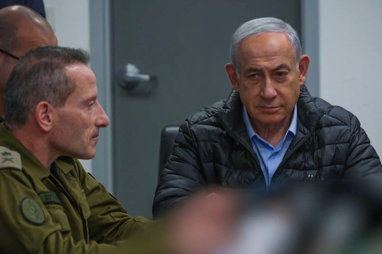 This screen grab taken from a handout video released by the Israeli government press office shows Prime Minister Benjamin Netanyahu attending a meeting in the command center of the defense ministry in Tel Aviv on October 26, 2024, as Israel conducts what it says are