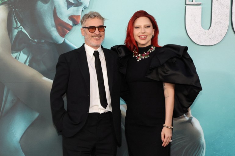 Cast members Joaquin Phoenix and Lady Gaga attend a premiere for the film"Joker: Folie a Deux", in Los Angeles, California, U.S., September 30, 2024. REUTERS/Mario Anzuoni