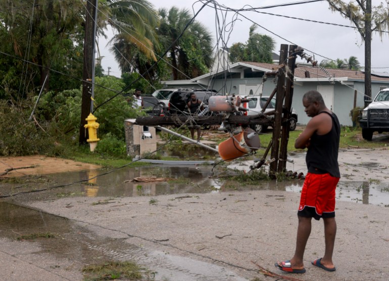 FORT MYERS, FLORIDA - OCTOBER 09: A power pole lays on the ground after it was snapped in half after what appeared to be a tornado passed through the area before Hurricane Milton's arrival on October 09, 2024, in Fort Myers, Florida. People are preparing for the storm, which could be a Cat 3 when it makes landfall on Wednesday evening. Joe Raedle/Getty Images/AFP (Photo by JOE RAEDLE / GETTY IMAGES NORTH AMERICA / Getty Images via AFP)