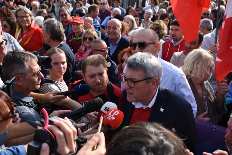 italy-2-1730003237 ROME, ITALY - OCTOBER 26: CGIL Secretary General Maurizio Landini is seen during a demonstration as people take part in anti-war march, which was organized with the initiative of labor unions, in Rome, Italy on October 26, 2024. Thousands of anti-war protesters gathered in Ostiense Square for the march in the capital, calling for an end to Israel's attacks on Gaza and Lebanon and the Russian-Ukrainian war. ( Barış Seçkin - Anadolu Agency )