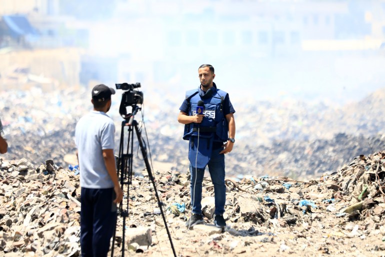 GAZA CITY, GAZA - AUGUST 13: Enes al-Sharif, the Gaza correspondent for the Qatar-based Al Jazeera television, who is targeted by Israeli Army Spokesperson Avichay Adraee, reports on the events in Gaza City, Gaza on August 13, 2024. (Photo by Dawoud Abo Alkas/Anadolu via Getty Images)
