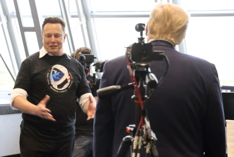 musk-trump-1724684904 U.S. President Donald Trump and Elon Musk tour the Firing Room Four after the launch of a SpaceX Falcon 9 rocket and Crew Dragon spacecraft on NASA's SpaceX Demo-2 mission to the International Space Station from NASA's Kennedy Space Center in Cape Canaveral, Florida, U.S. May 30, 2020. REUTERS/Jonathan Ernst