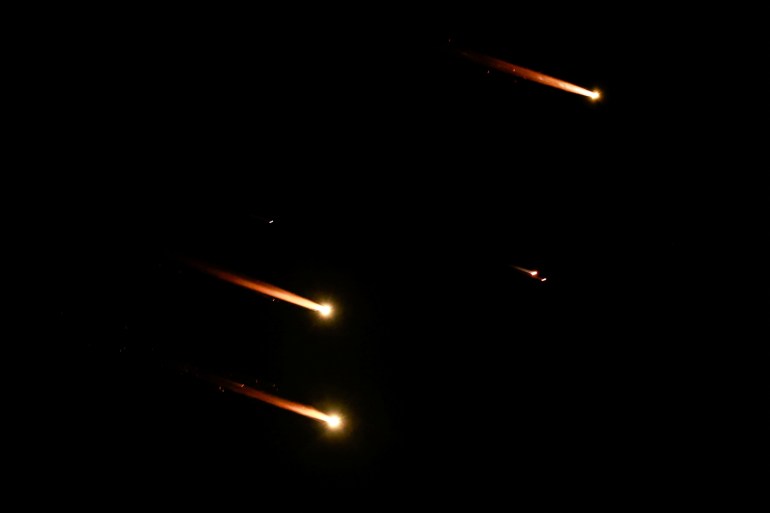 Rockets fly in the sky, amid cross-border hostilities between Hezbollah and Israel, as seen from Tel Aviv, Israel, October 1, 2024. REUTERS/Ammar Awad